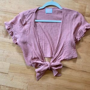 Pink wrap short sleeve crop top in size small